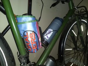 Use a spare bottle cage as a bag holder